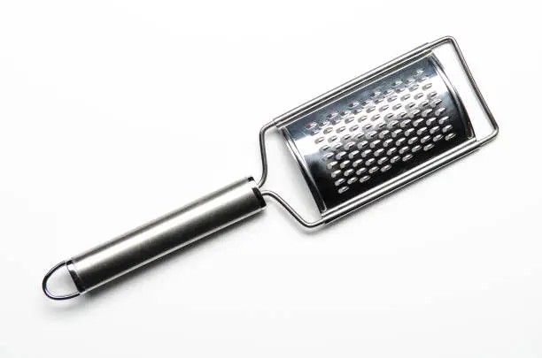 a nutmeg grater on white background, isolated