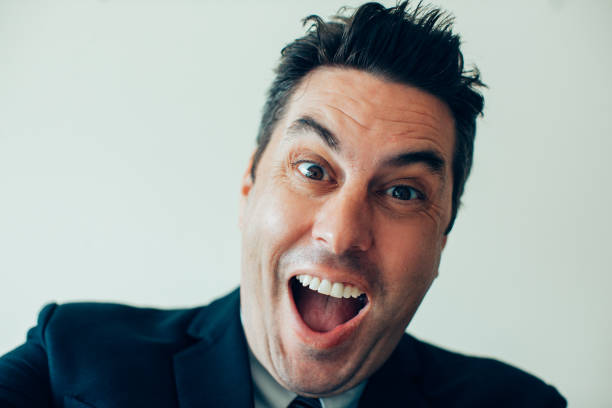 istock Close-up of crazy businessman looking at camera 932635736