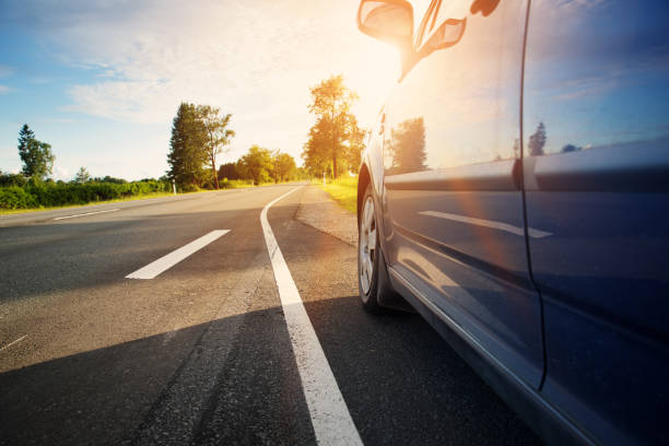 istock Car on asphalt road in summer 932645662
