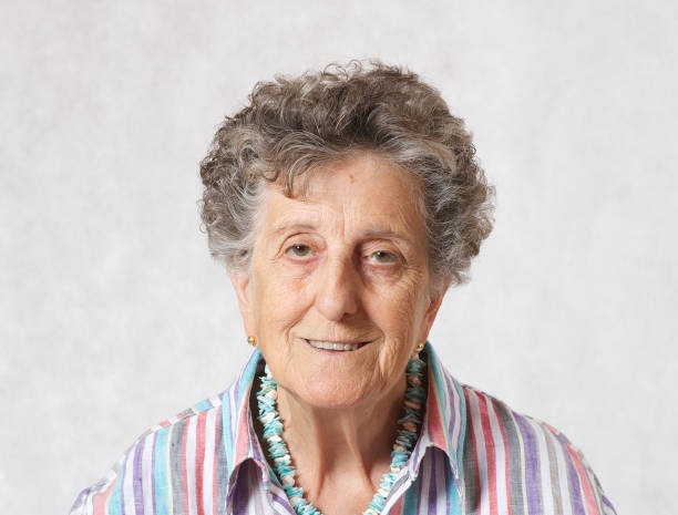 istock Old smiling woman between 70 and 80 years old. 932654570
