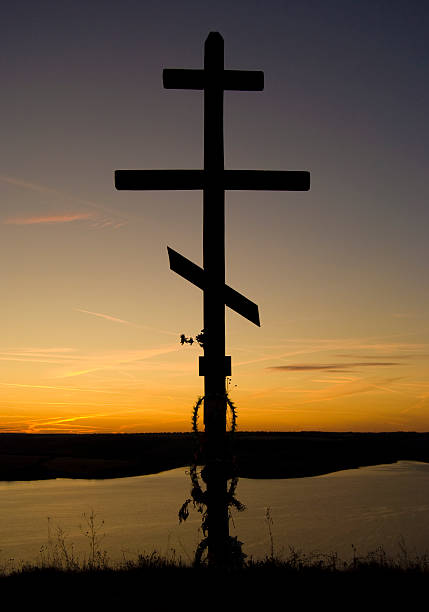 istock Orthodox cross on a beautiful sunset 93266248