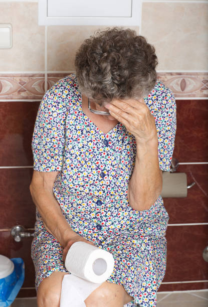 Senior woman in her bath room