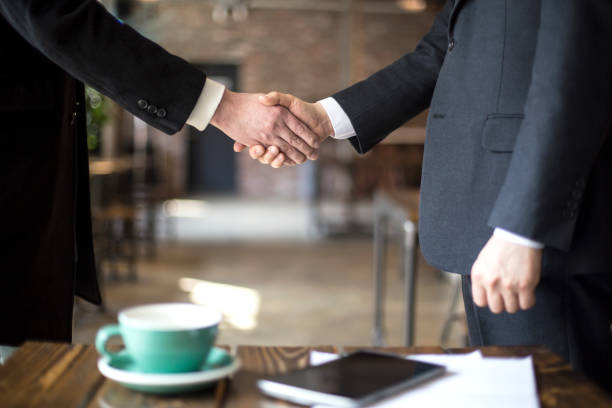 istock Business man giving business card 932668908