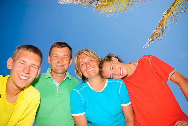 Teens with parents stock photo