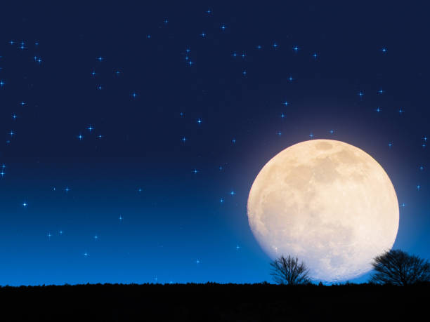 istock Full Moon from the mountain silhouettes landscape. My astronomy work. 932675554