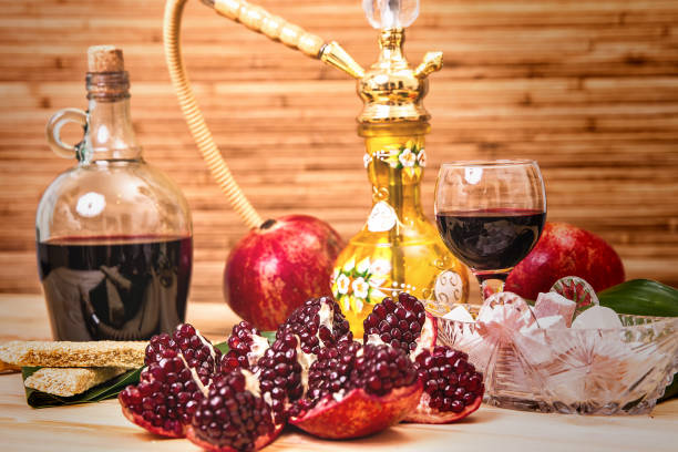 istock Still-life with Hookah, wine, garnet and sweets 932678490
