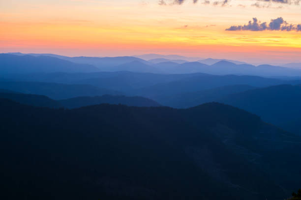istock Colorful sky above the mountain ridges during sunset 932679270