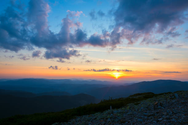 istock Stunning sunset in the mountains 932679356