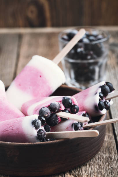 istock Ice pops with berry and Greek yoghurt 932680524