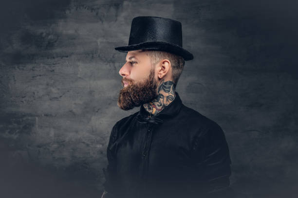 istock Brutal bearded male over grey background. 932696612