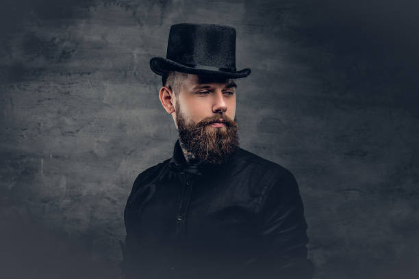 istock Brutal bearded male over grey background. 932696734