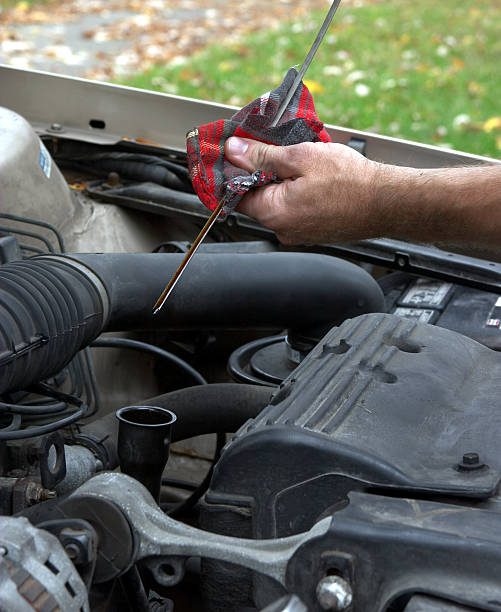 istock Automotive - Checking The Oil 93269675