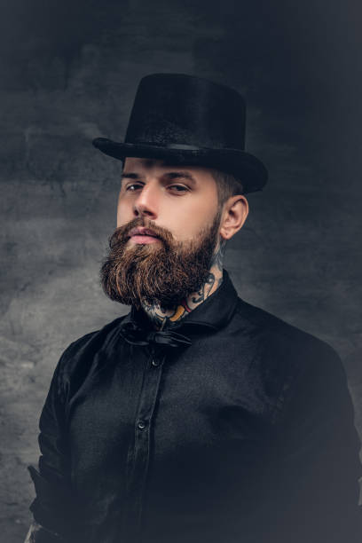 istock Brutal bearded male over grey background. 932696894
