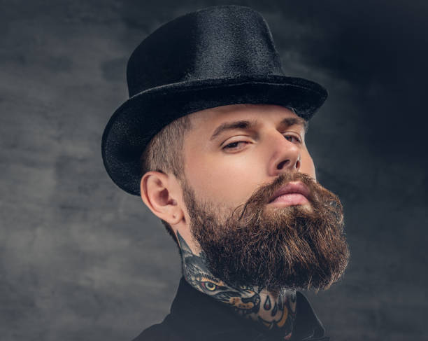 istock Brutal bearded male over grey background. 932700568