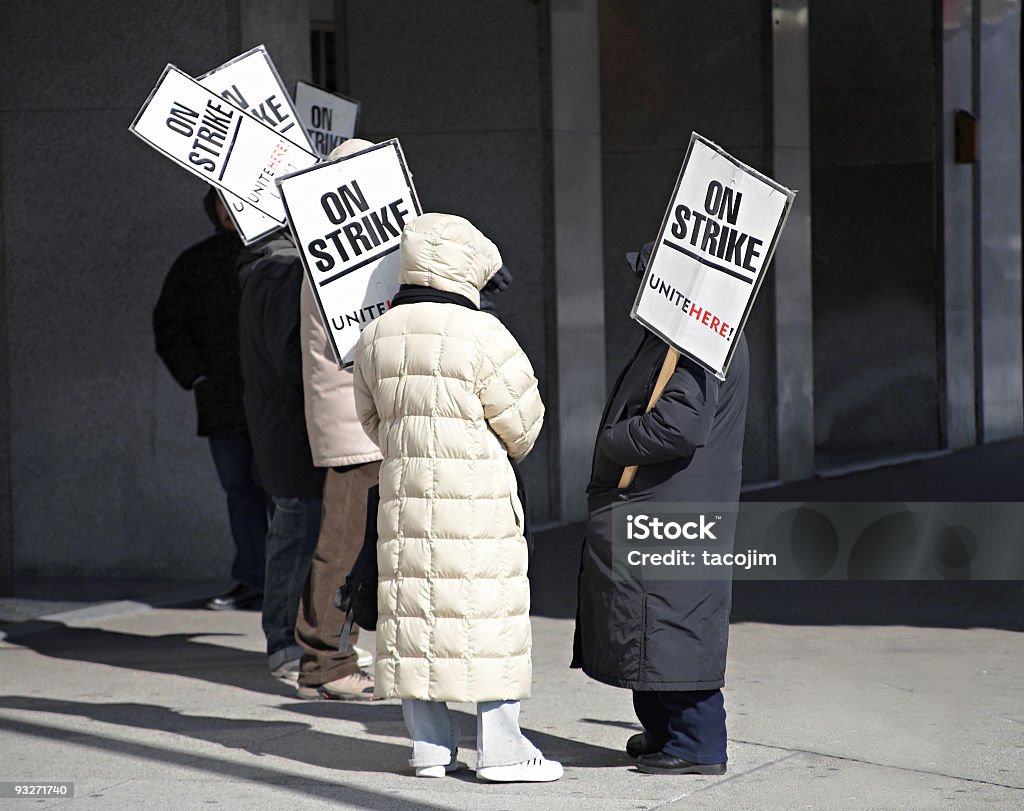 Labor Dispute Workers on strike outside a hotel Strike - Protest Action Stock Photo