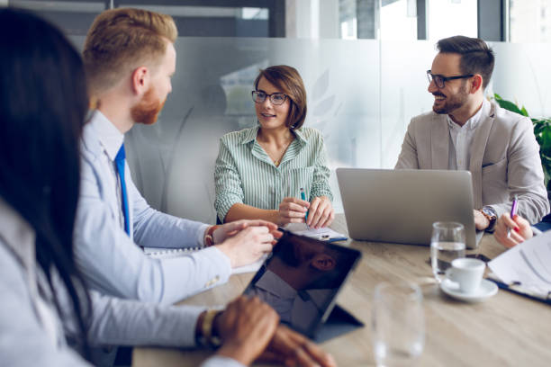istock Group of business people brainstorming about innovative ideas 932717698