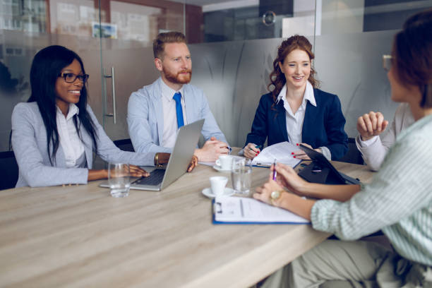 istock Group of business people brainstorming about innovative ideas 932718204