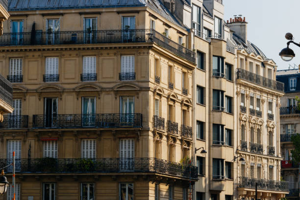 istock Paris residential buildings facades. Old Paris architecture 932725236