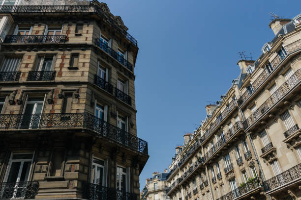 istock Paris residential buildings facades. Old Paris architecture 932725406
