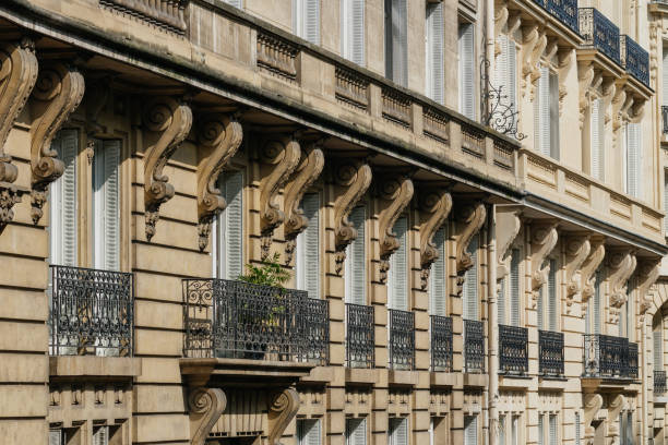 istock Paris residential buildings facades. Old Paris architecture 932725998