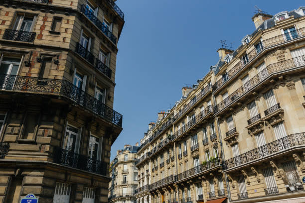 istock Paris residential buildings facades. Old Paris architecture 932726142