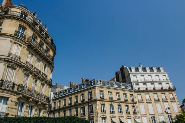 istock Paris residential buildings facades. Old Paris architecture 932726330