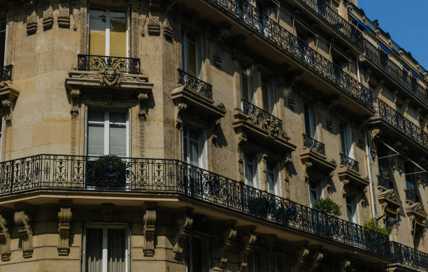 istock Paris residential buildings facades. Old Paris architecture 932726332