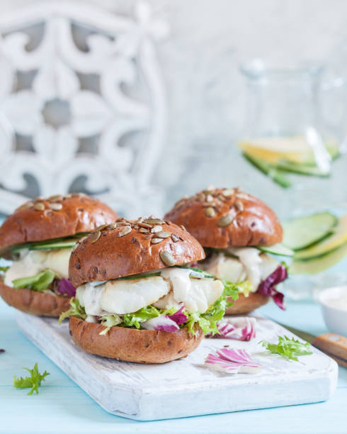 istock White fish fillet sandwich with tartar sauce 932729054