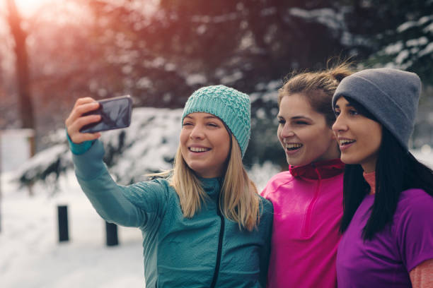 istock Young Women Jogging At Winter Time 932729114