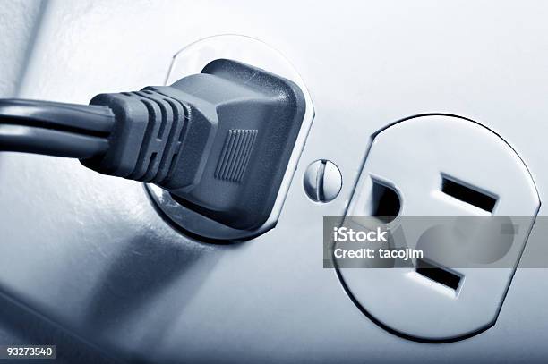 Electrical Outlet With A Black Plug In One Socket Stock Photo - Download Image Now - Close-up, Color Image, Contrasts