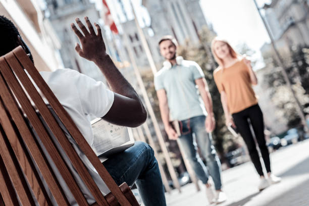 istock Young people meeting outdoors 932742596