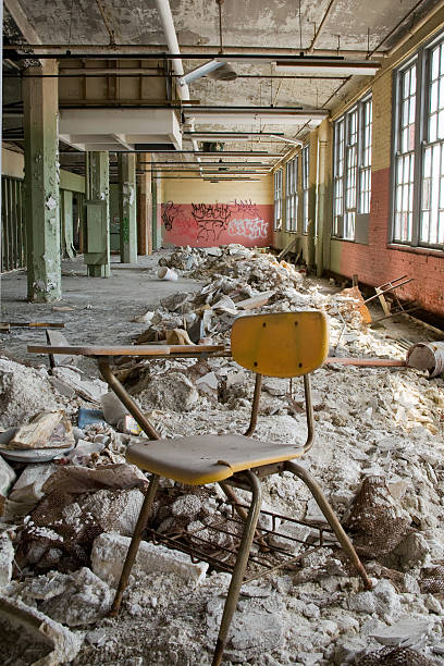 Interior photo of an abandoned rundown school building stock photo