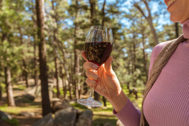 Woman holding a glass of wine