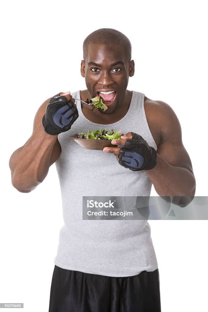 Bodybuilder com Salada - Royalty-free Comer Foto de stock