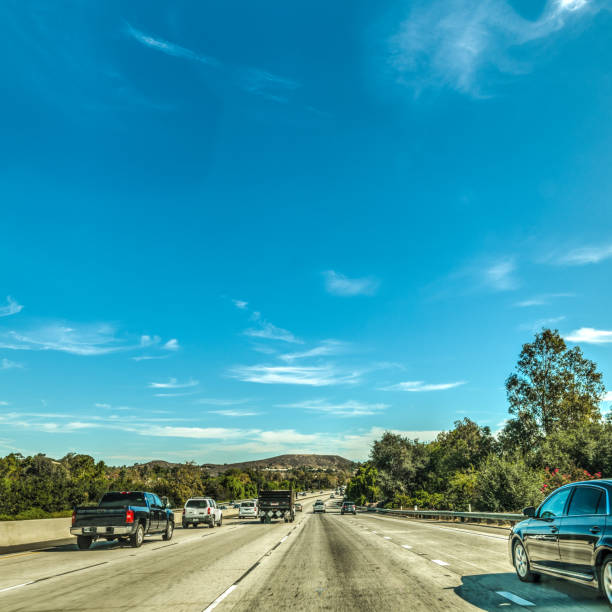 Traffic on Pacific Coast Highway southbound Traffic on Pacific Coast Highway southbound. California, USA san diego freeway stock pictures, royalty-free photos & images