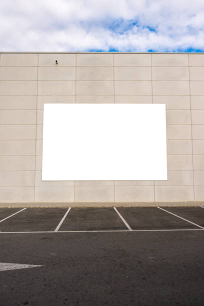 istock Mock up. Big blank billboard outdoors, outdoor advertising, public information board on the wall. 932760334