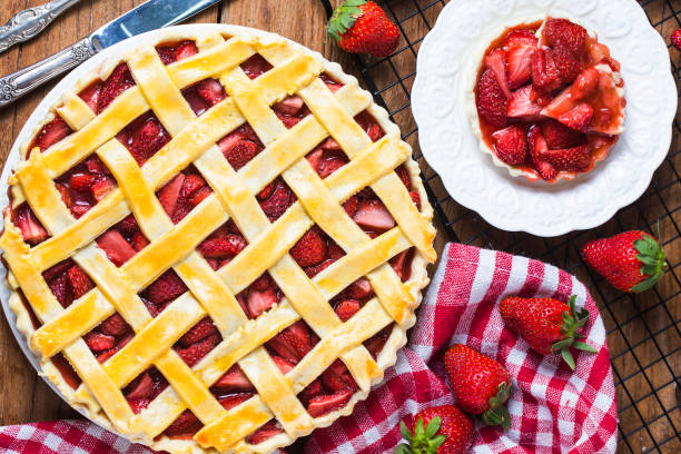 istock The strawberry pie in the wooden background 932760698