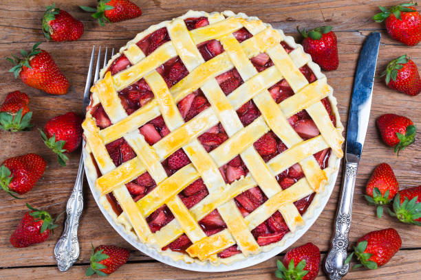 istock The strawberry pie in the wooden background 932760740