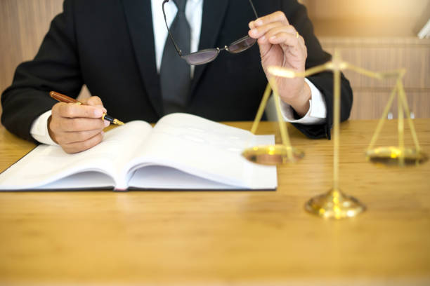 istock lawyer or  judge work in the office with gavel 932768780