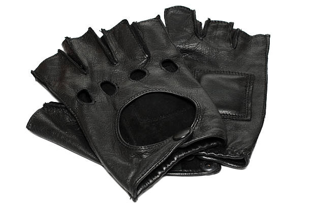 две черные кожаные перчатки без пальцев - glove leather black isolated стоковые фото и изображения