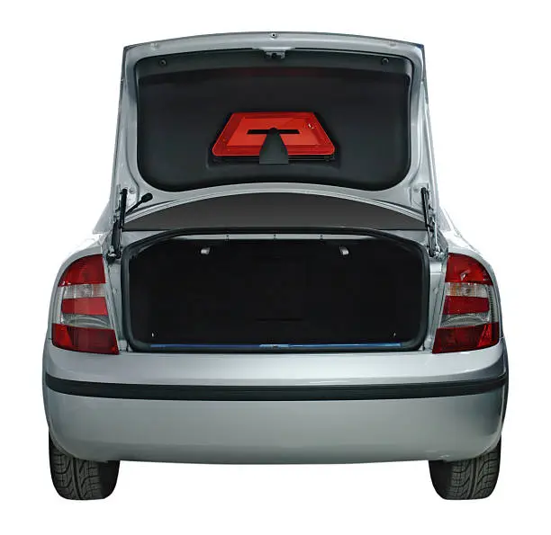 Photo of Rear view of a generic car with an open trunk