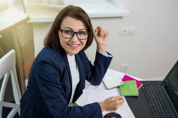 istock Designer or architect posing and looking at you 932775226