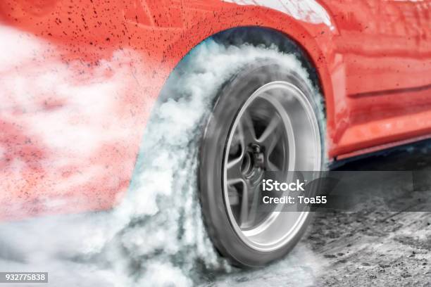 Drag Racing Car Burns Rubber Off Its Tires In Preparation For The Race Stock Photo - Download Image Now