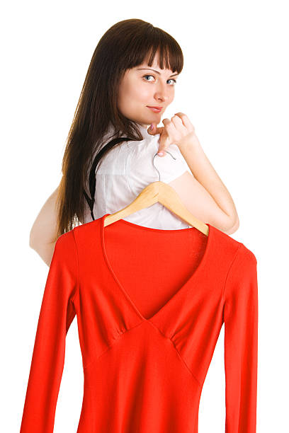 istock Beautiful lady trying on a red dress 93277619
