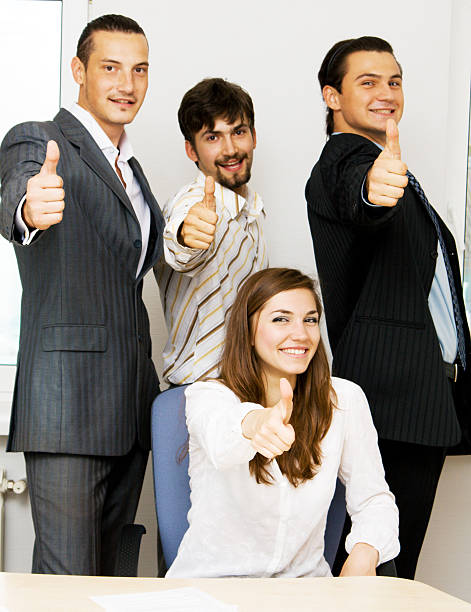 istock Successful business team showing thumbs up 93277772