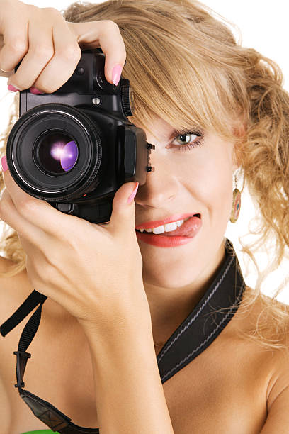 istock Cheerful young woman taking a picture 93277811