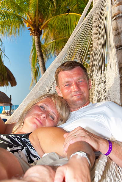 Couple on hammock stock photo