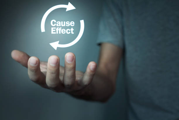 istock Man holding Cause Effect Arrows. Information concept. 932782518