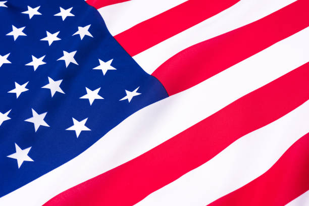 istock Beautifully waving star and striped American flag. 932783294