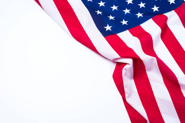 istock Closeup of American flag on white background. 932783358